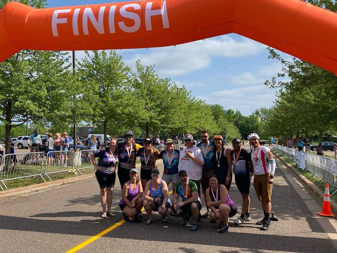Team at finish line, second angle